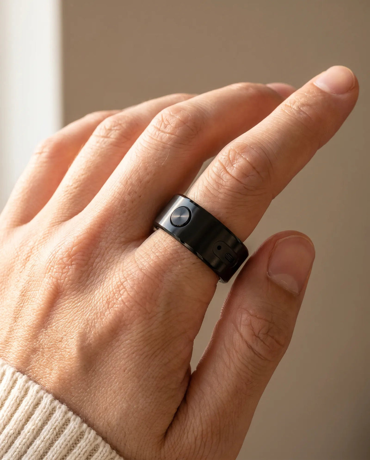 The black ring worn on a hand