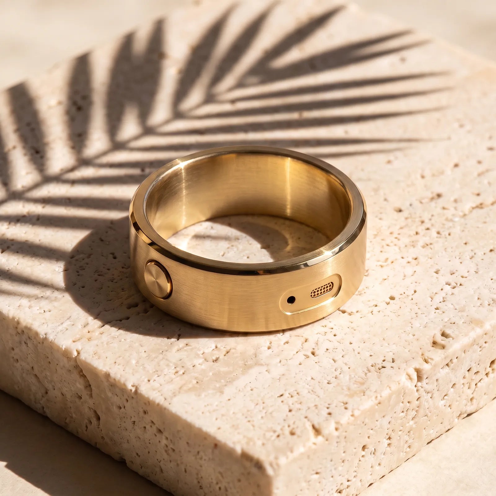 The gold ring on travertine stone